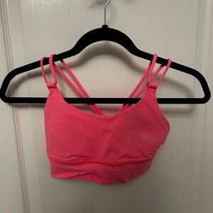 Bright pink lululemon sports bra